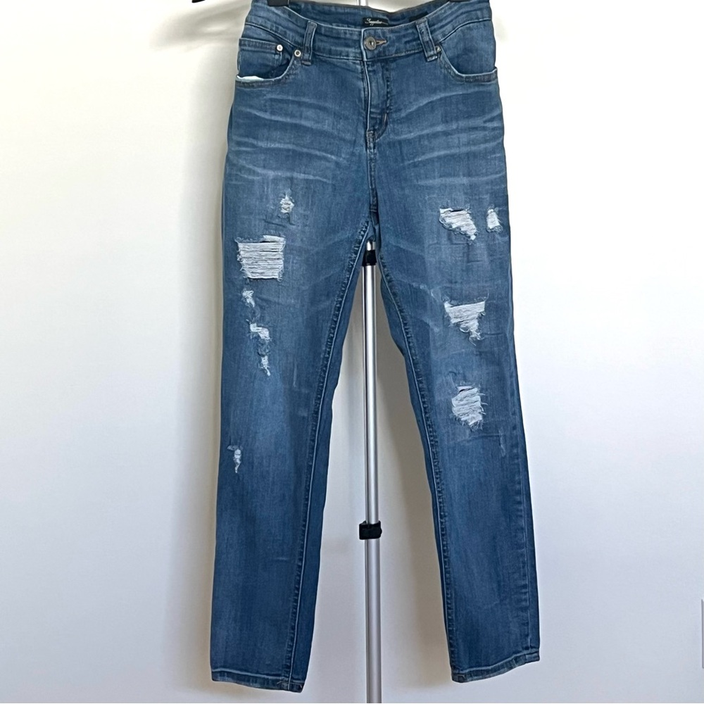 Supplies…Women’s Distressed Blue Jeans Blue Jeans Size 12
